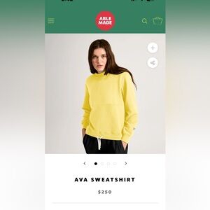 Abel made bright yellow sweatshirt